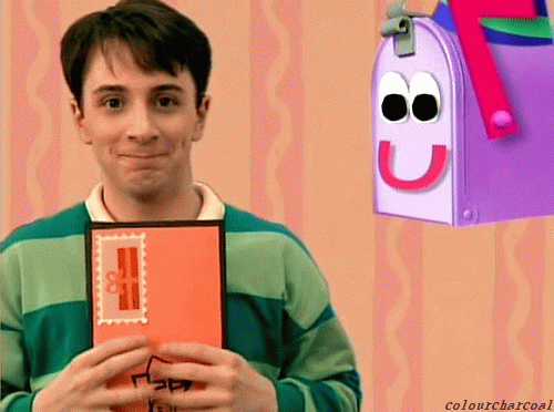 Animated GIF of Steve from Blue's Clues holding an envelope beside the Mailbox character